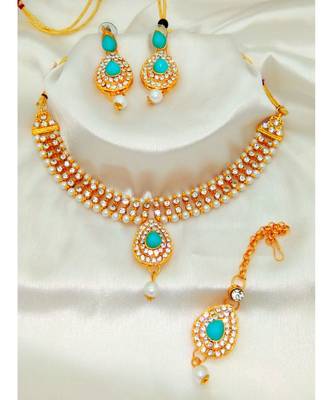 Gold plated jewelry set with earrings and Maangtikka in Sky Blue color 1