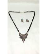 Mangalsutra in three round metal ball design with 2 line Black and Rhodim beads