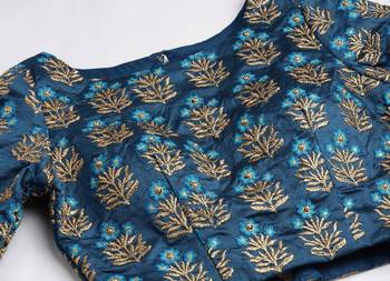 Turquoise embroidered silk semi stitched lehenga 6