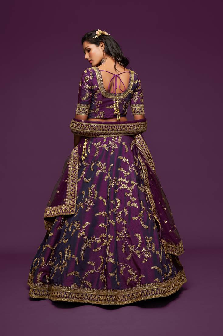 Mesmerizing Purple Thread, Zari, Dori, and Sequins Embroidered Art Silk Bridal Lehenga