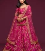 Hypnotizing Hot Pink Thread, Zari, Dori, and Sequins Embroidered Art Silk Lehenga