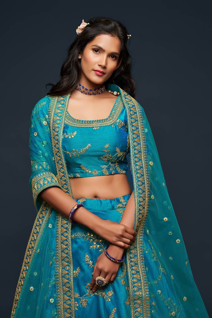 Enchanting Teal blue Thread, Zari, Dori, and Sequins Embroidered Art Silk Bridal Lehenga choli