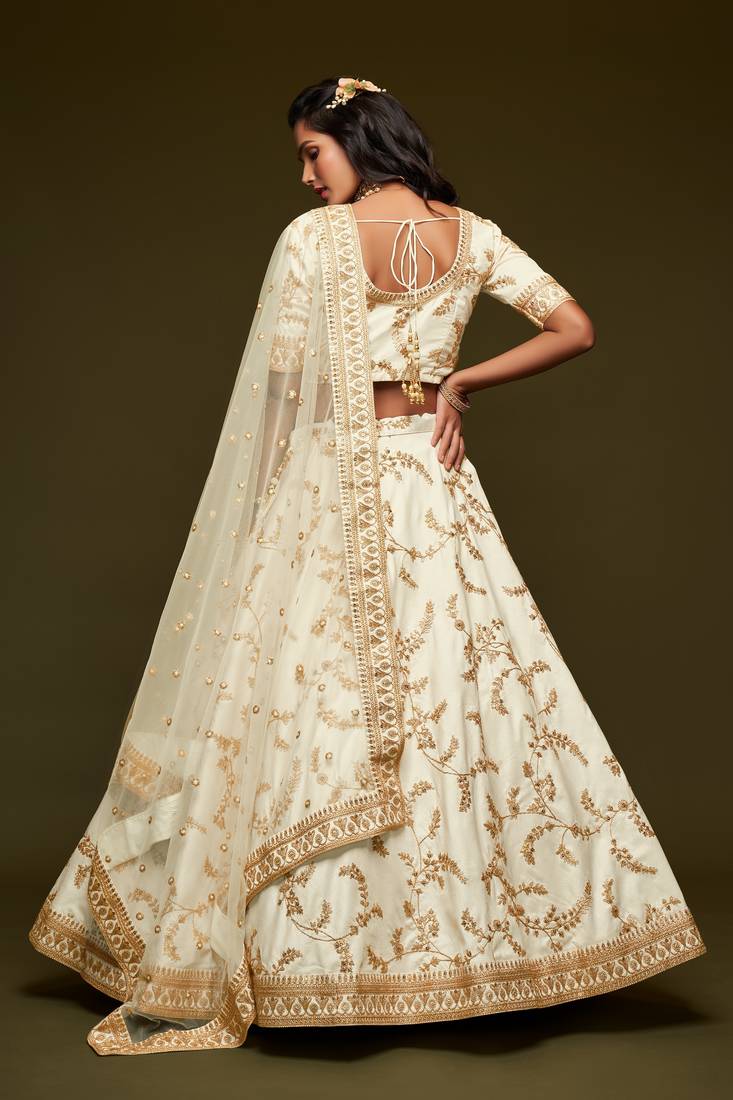 Graceful White Thread, Zari, Dori, and Sequins Embroidered Art Silk Semi Stitched Party wear Lehenga choli