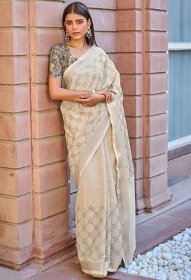 Cream embroidered linen saree with blouse 1