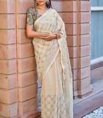 Cream embroidered linen saree with blouse