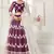 Wine embroidered net semi stitched lehenga