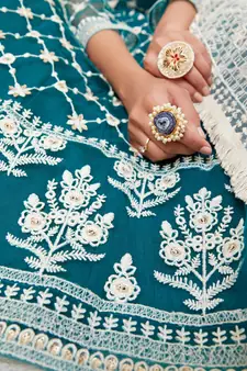 Teal  embroidered net semi stitched lehenga