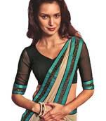 Beige printed georgette saree with blouse