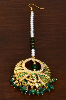 Gold panna stone embellished jadau maang-tikka JMT42