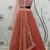 gorgeous Orange Thread and Sequins Embroidered Georgette Semi Stitched Party Wear Lehenga