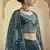 Rama green sequins and thread embroidered crepe stitched lehenga