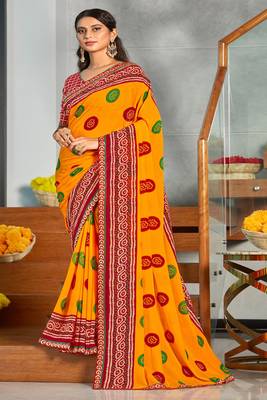 Orange printed georgette saree with blouse 1