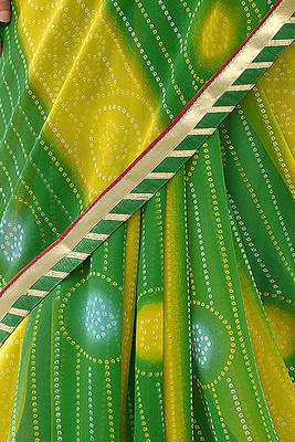 Green printed pure georgette saree with blouse 3