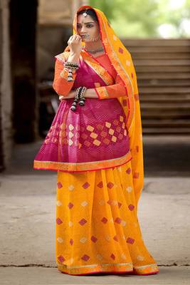 Yellow printed pure georgette saree with blouse 1