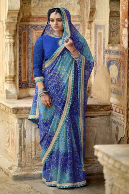 Blue printed pure georgette saree with blouse 1