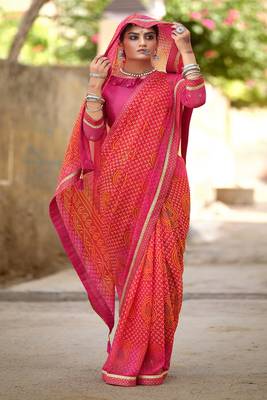 Pink printed pure georgette saree with blouse 1