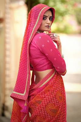 Pink printed pure georgette saree with blouse 2