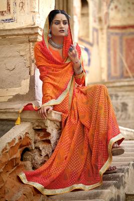 Orange printed pure georgette saree with blouse 2