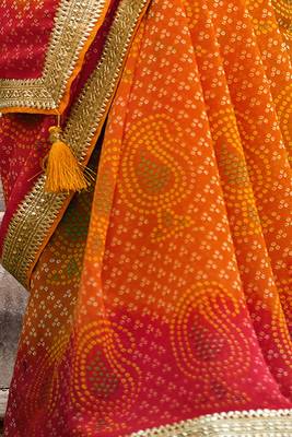 Orange printed pure georgette saree with blouse 3