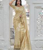 Cream woven banarasi silk saree with blouse