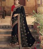 Black embroidered georgette saree with blouse