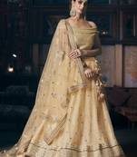 Beige embroidered net semi stitched lehenga