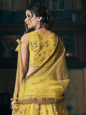 Yellow embroidered net semi stitched lehenga 3