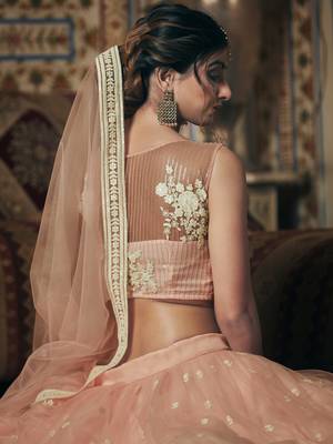 Pink embroidered net semi stitched lehenga 3