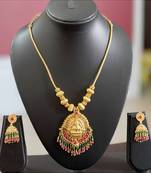 Gorgeous Gold Plated Lakshmi Necklace Set With Ruby Emerald Beads