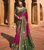 rani pink embroidered silk saree with blouse