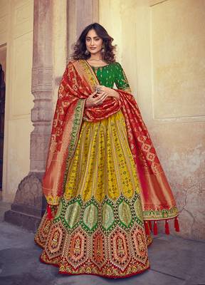 Yellow embroidered silk semi stitched lehenga 1