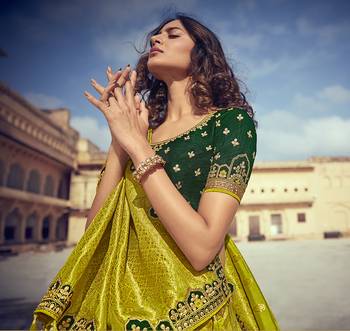 Green embroidered silk semi stitched lehenga 2