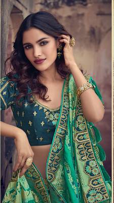 Teal embroidered silk semi stitched lehenga 2