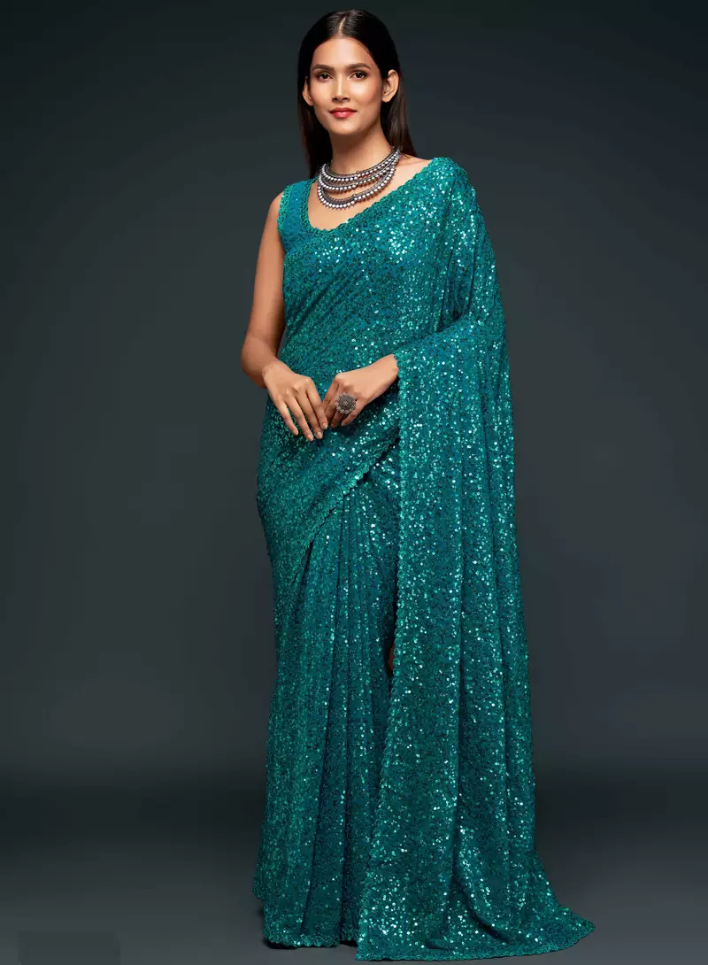 Teal embroidered georgette saree with blouse