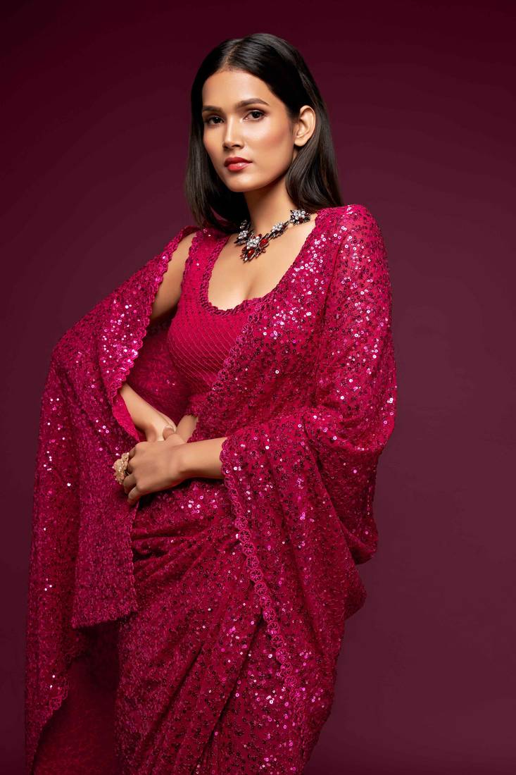 Pink embroidered georgette saree with blouse