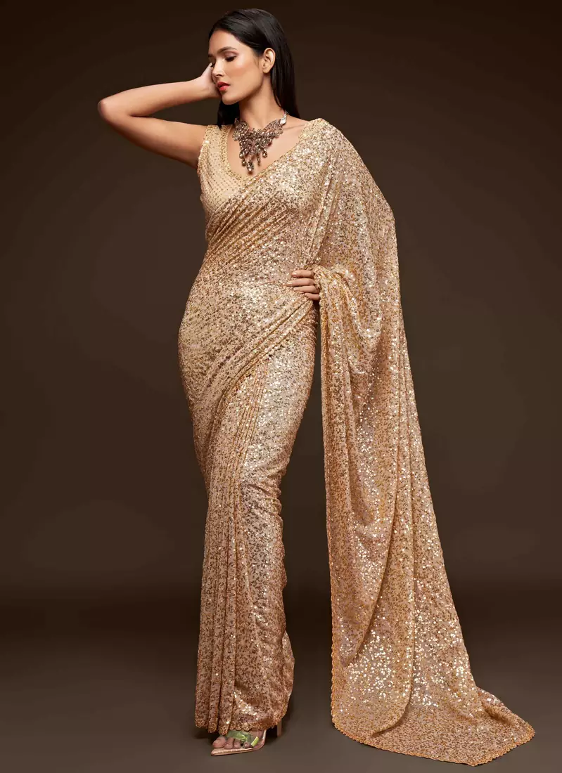 Beige embroidered georgette saree with blouse