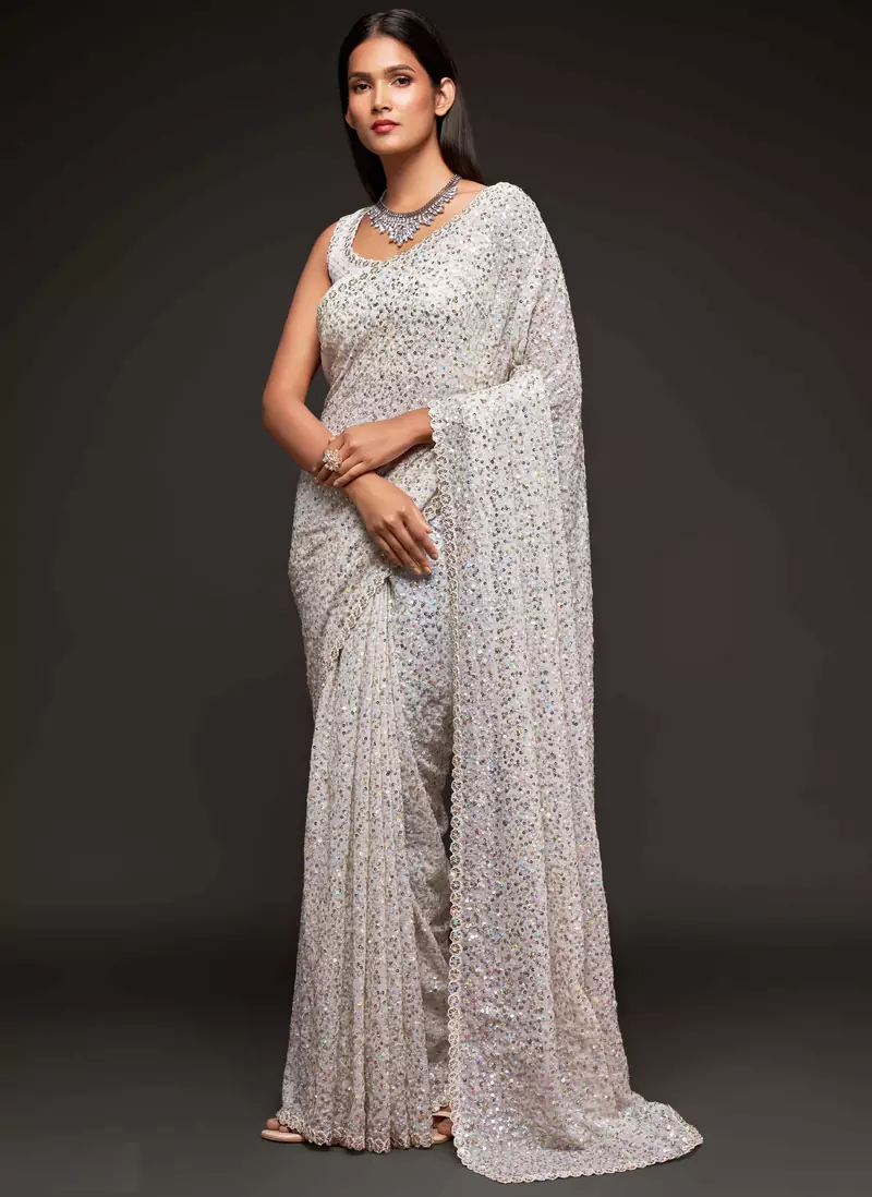 Off white embroidered georgette saree with blouse