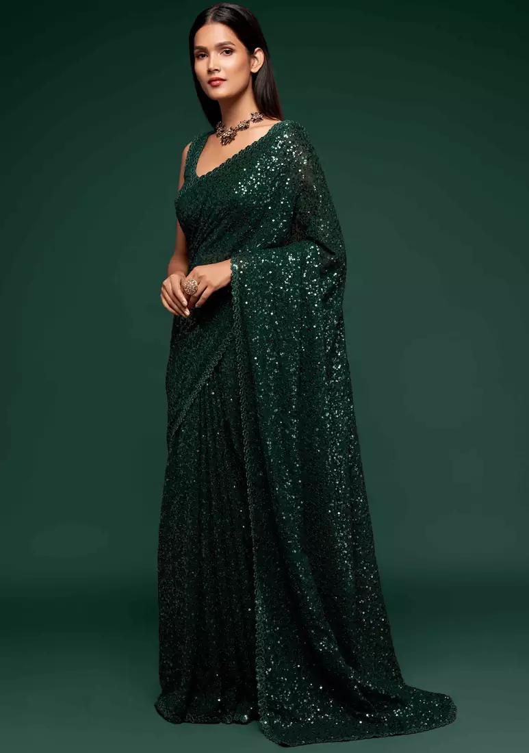 Dark green embroidered georgette saree with blouse