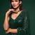 Dark green embroidered georgette saree with blouse