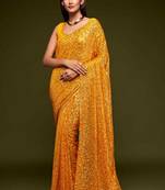 Yellow embroidered georgette saree with blouse