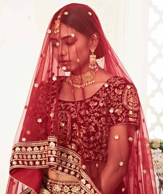 Red embroidered velvet semi stitched lehenga 3