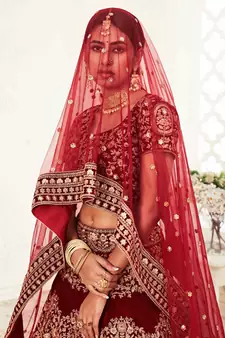 Red embroidered velvet semi stitched lehenga