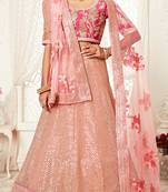 Pink embroidered net semi stitched lehenga