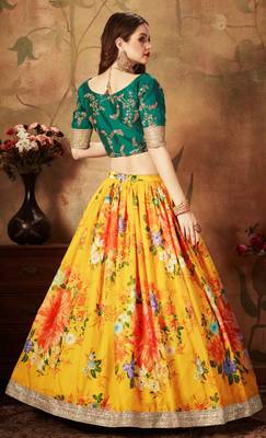 Yellow embroidered organza semi stitched lehenga 2