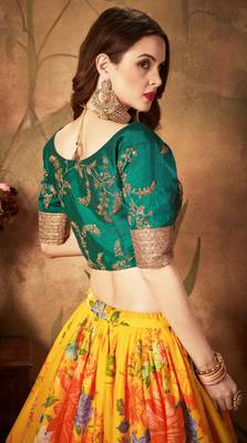 Yellow embroidered organza semi stitched lehenga 5