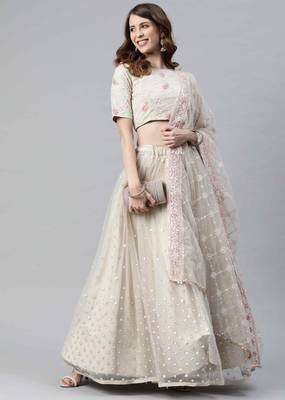 Beige embroidered net semi stitched lehenga 4