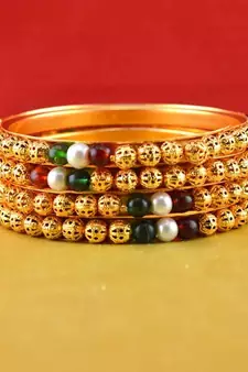 Rajasthani gokharoo,kara churi meenakari,moti,cz,stone,bangles 