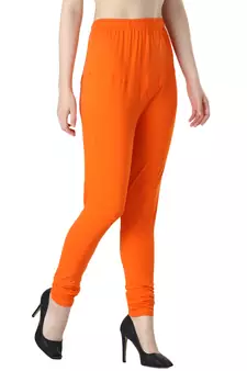Women Orange Solid Churidar Leggings