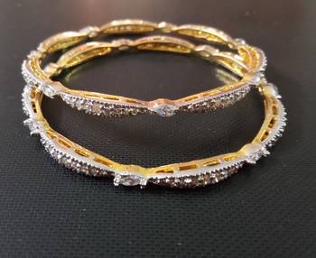Gold cubic zirconia bangles-and-bracelets 1