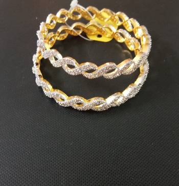 Gold cubic zirconia bangles-and-bracelets 1